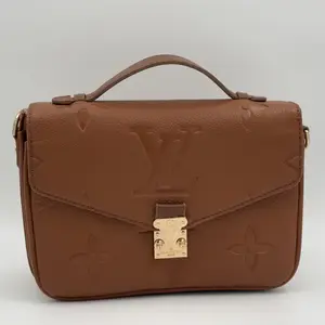 LOUIS VUITTON Pochette Métis Monogram Empreinte Leather - image 112