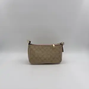 Coach Top Handle Pouch in Signature Canvas - image 510