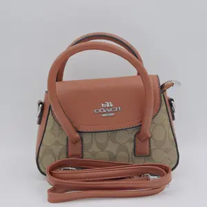 Andrea Mini Carryall Bag In Signature Canvas - image 48