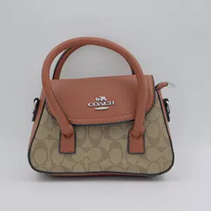 Andrea Mini Carryall Bag In Signature Canvas - image 47