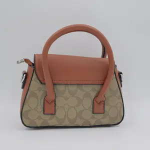 Andrea Mini Carryall Bag In Signature Canvas - image 46