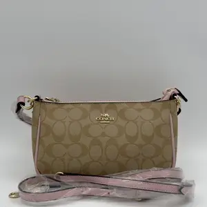 Coach Top Handle Pouch in Signature Canvas - image 506