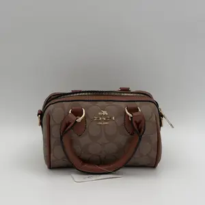 Coach Mini Rowan Crossbody Bag in Signature Canvas - image 414