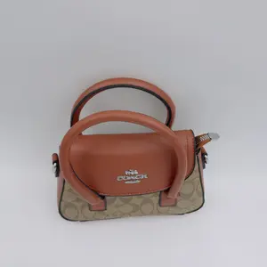 Andrea Mini Carryall Bag In Signature Canvas - image 45