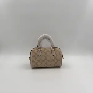 Coach Mini Rowan Crossbody Bag in Signature Canvas - image 410