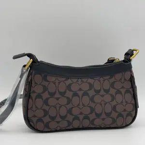 Coach Teri Shoulder Bag in Signature Canvas. - image 11