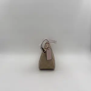 Coach Top Handle Pouch in Signature Canvas - image 509