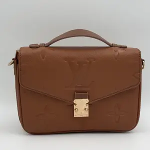 LOUIS VUITTON Pochette Métis Monogram Empreinte Leather - image 114