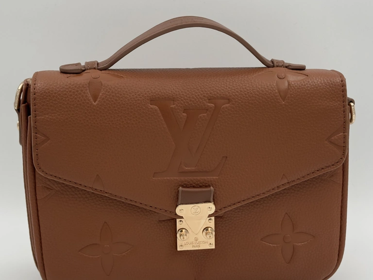 LOUIS VUITTON Pochette Métis Monogram Empreinte Leather