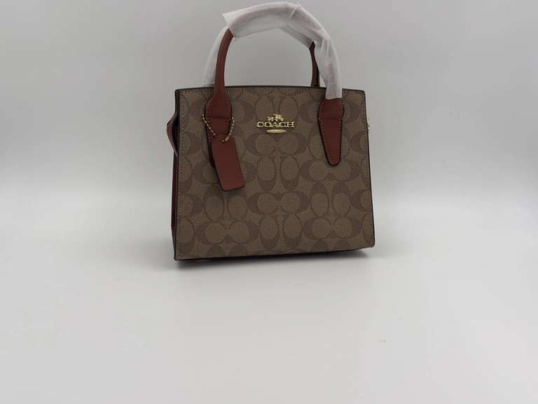 Coach Andrea Carryall